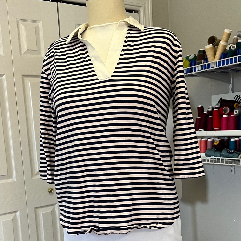 Striped pale pink and navy knit 3/4 sleeve top with collar.